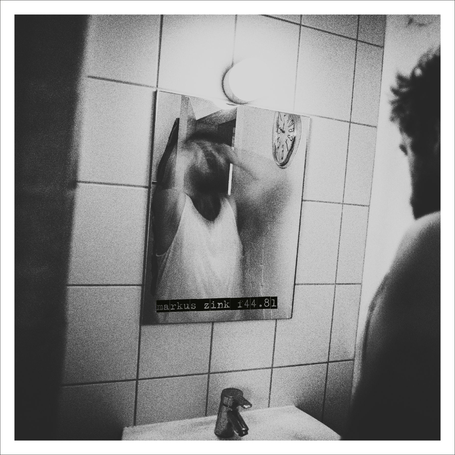 f44.81 album artwork: a black and white photograph of a mirror on a tiled wall