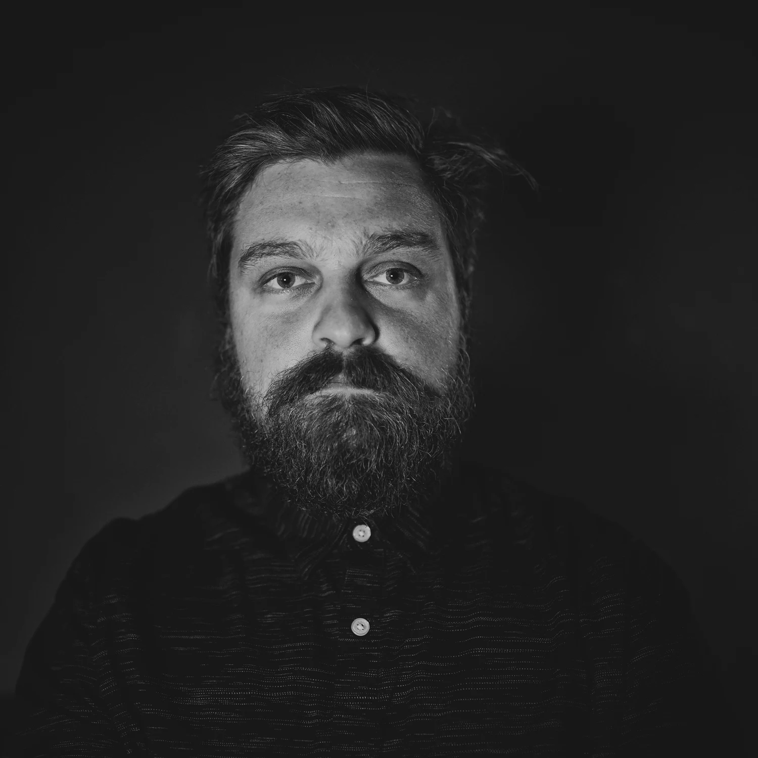 Black and white frontal portrait of Markus Zink